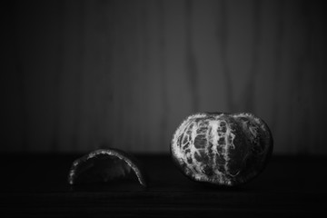 black and white still life of ripe tangerines