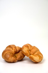 Tasty croissant on white background.	