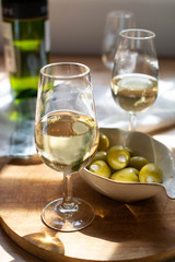 Sherry wine tasting, dry fino, manzanilla or palomino jerez fortified wine in glasses, Jerez de la Frontera, Andalusia, Spain