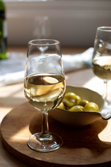Sherry wine tasting, dry fino, manzanilla or palomino jerez fortified wine in glasses, Jerez de la Frontera, Andalusia, Spain
