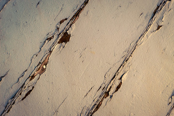 peeling paint on the wall