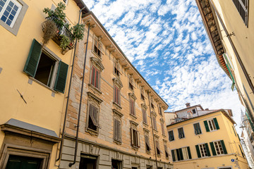 Old and renewed Italian buildings in Lucca, Tuscany.
