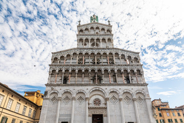 Naklejka premium View of Chiesa di San Michele in Foro. Roman Catholic basilica church in Lucca, Tuscany, central Italy, built over the ancient Roman forum