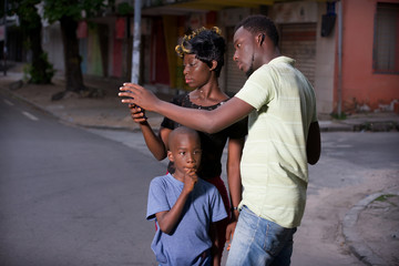 Happy couple checking the contents of the smart phone