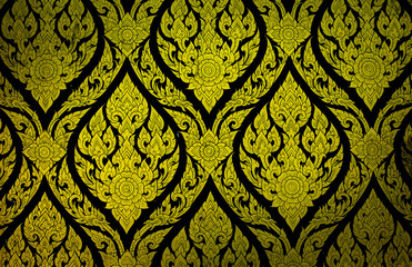 Closeup Thai pattern carving lotus picture at door in temple