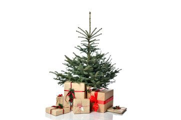 Natural christmas tree decorated with x-mas red patchwork ornament artificial balls craft presents gifts for new year 2020