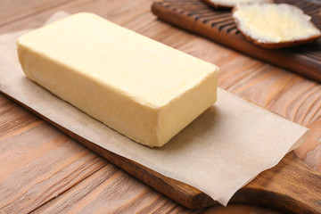 Tasty fresh butter on table