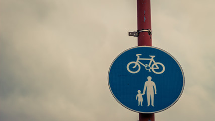 sign on red lamp post