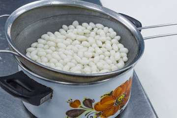 Prepare white flour ball to make popular Thai dessert called Pla Krim Kai Tao, Sweet Rice Noodles with Coconut Cream seperate to two parts,white sour part mix with sweet part make by brown sugar syrup