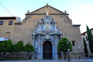 Fototapeta na wymiar Monastery of St. Jerome Spanish (Monasterio de San Jeronimo), a Roman Catholic church and Hieronymite monastery in Granada, Spain. 