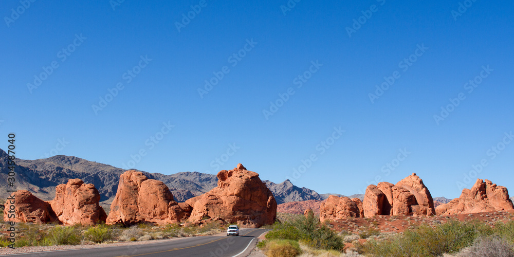 Wall mural Car on scenic drive through the 