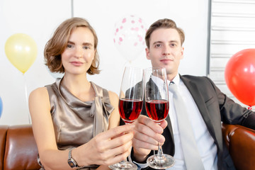 A couple is enjoying a romantic party.