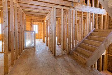 Framing beam of new house under construction home framing