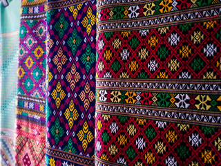 Thai silk fabric - Handmade woven fabrics of Thai silk textiles with traditional decoration ornaments beautiful cultural