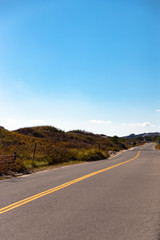 Open road view of Old Montauk Highway in the fall