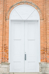 Fototapeta na wymiar church building old vintage orange red doors arch