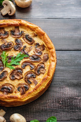 Jellied pie with meat and mushrooms on potato dough