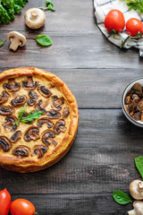 Jellied pie with meat and mushrooms on potato dough