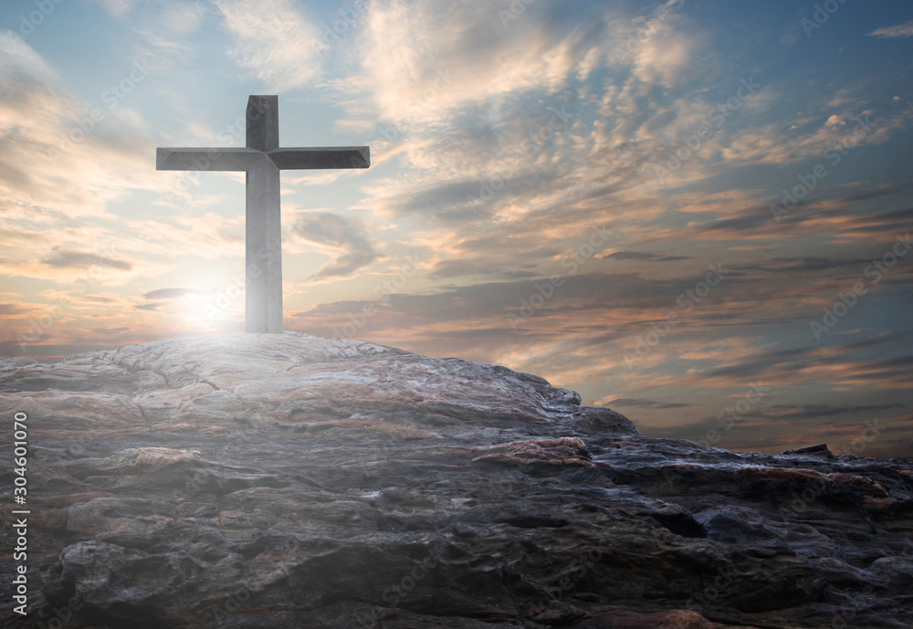 Wall mural cross the crucifixion on the mountain jesus christ with a sunset background