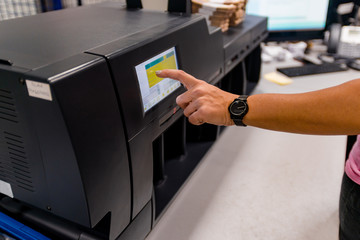 Accountant operating with electronic counting machine