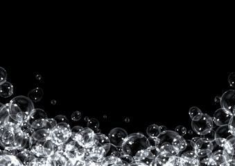 Soap bubbles on black background with copy space