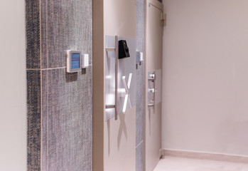 Two secured metal safe doors with authorization devices