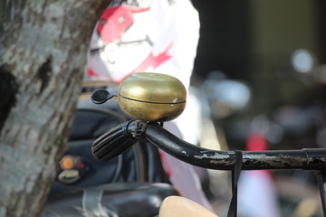 Fototapeta na wymiar antique ancient bicycle bells on the roadside