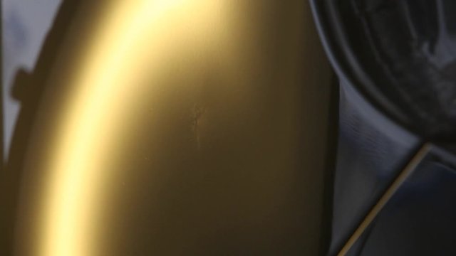 rectification of dents on the metal surface of the car. Metal heating, reflection on the car