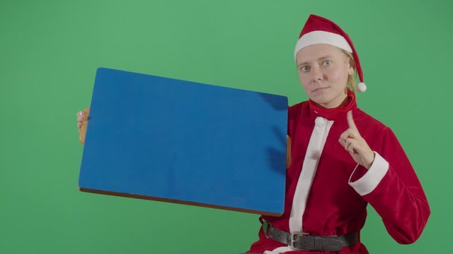 Woman Santa Claus Making Something Appear On A Board