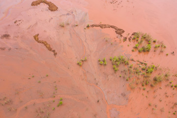 Aerial photography wild red mud water marsh top view