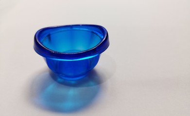 small blue bowl on white background