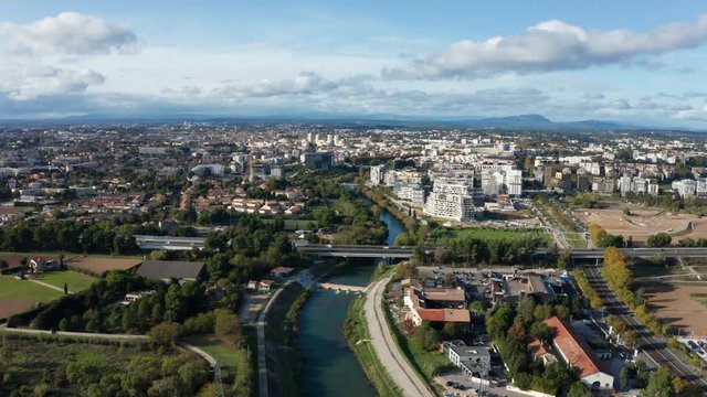 Montpellier Lez river aerial view Port Marianne neighbourhood modern bridge and highway sunny day 