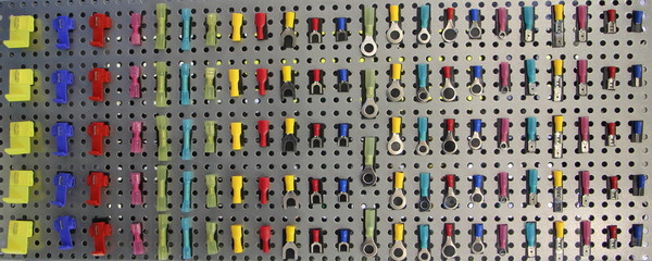 A many 12v colored clamp wire connection terminals , car electric equipment, texture for background