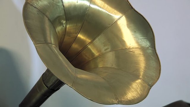 Man Lifting Antique Gramophone - Close Up