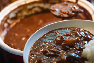 Homemade Delicious traditional japanese style beef curry soup in hot pot.