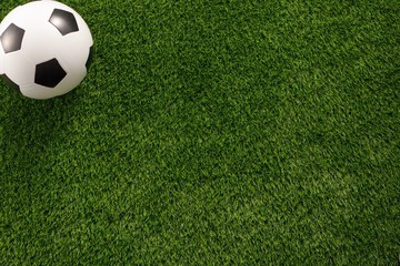 Soccer ball on the green field. View from above. flat lay. The concept of football matches.Copy space.