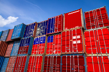 The national flag of Taiwan on a large number of metal containers for storing goods stacked in rows...