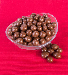 Obraz premium Chocolate ball or chocolate balls in bowl on background new.