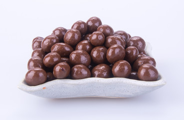 Chocolate ball or chocolate balls in plate on background new.