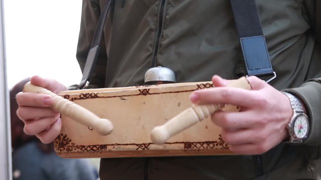 Man playing on the wood block percussion