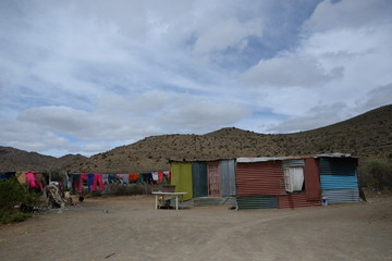 washing on line of colorful house