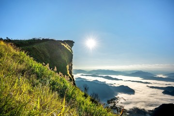 Scenic Panorama picture or postcard view of layer mountain,Blue sky and sunrise background at Phu Chi Fah,Thailand.Beautiful nature outdoor scene landscape.Vacation Holiday. 