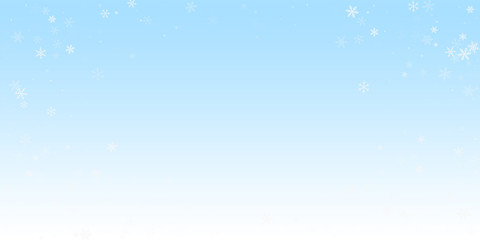 Fototapeta premium Sparse snowfall Christmas background. Subtle flyin