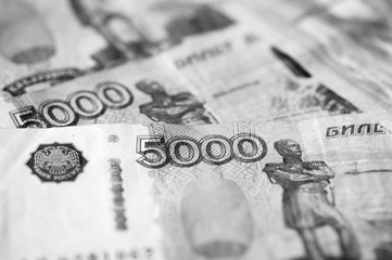 Russian banknotes of five thousand rubles close-up. Monochrome money background