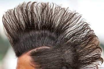 Iroquois hairstyle on a man’s head