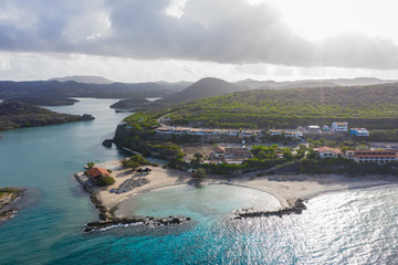 Aerial view of coast of Curaçao in the Caribbean Sea with turquoise water, cliff, beach and...