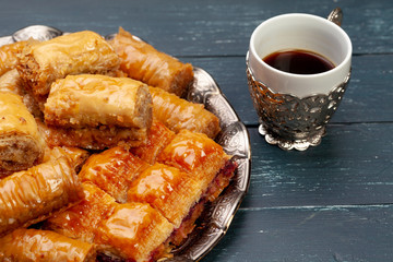Plate of baklava dessert close up served on table