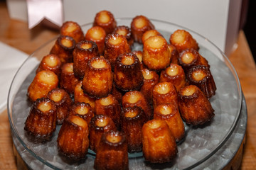 tray of french caneles or canneles