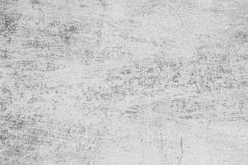 Texture of a concrete wall with cracks and scratches which can be used as a background