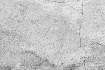 Obraz premium Texture of a concrete wall with cracks and scratches which can be used as a background